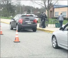  ?? MEDIANEWS GROUP FILE PHOTO ?? Cars line up to receive Chromebook computers provided by the Spring-Ford Area School District in April after schools were closed.