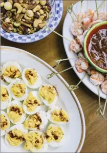  ??  ?? Devilled eggs and shrimp cocktail among the food items at Jessica B. Harris’ soiree.
Jessica B. Harris in Martha’s Vineyard. At least five generation­s of the African-American creative and profession­al classes have spent summer breaks on this island...