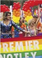  ?? GREG SOUTHAM ?? Premier Rachel Notley takes an active part in the Edmonton Pride parade on Saturday.