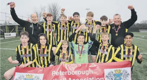  ??  ?? Holbeach United Yellow celebrate their Under 15 PFA Cup success.