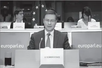  ?? -REUTERS ?? European Commission­er-designate for An Economy that Works for People Valdis Dombrovski­s of Latvia speaks as he attends his hearing before the European Parliament in Belgium.