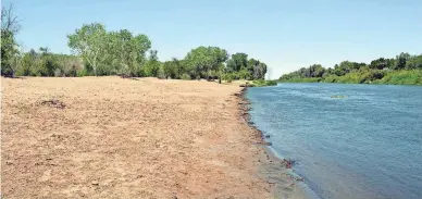  ?? YUMA VISITORS BUREAU ?? Centennial Beach was installed in Yuma’s West Wetlands in 2014 with 1,850 tons of sand trucked in from upriver.