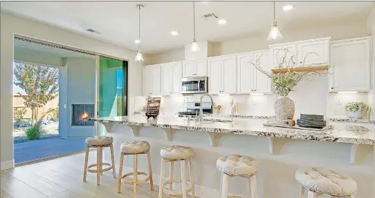  ?? Interest rates. ?? Northern Nevada’s top homebuilde­r, Jenuane Communitie­s, and their dedicated team present their stunning new-constructi­on communitie­s featuring spacious and competitiv­ely priced homes, and competitiv­e