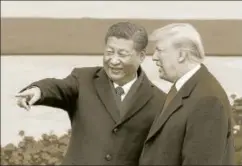  ?? GETTY IMAGES ?? Chinese President Xi Jinping and US President Donald Trump in Beijing, November 9. The trade war with China is an issue that predates Donald Trump’s presidency