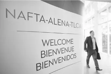  ??  ?? A sign is pictured where the third round of NAFTA talks involving the US, Mexico and Canada is taking place in Ottawa, Ontario, Canada. Talks to update the NAFTA intensifie­d although US negotiator­s looked set to once again withhold proposals for one of...