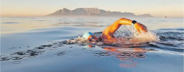  ?? | CAPE OF GOOD HOPE SPCA. ?? GUINNESS World Record holder and endurance swimmer Howard Warrington completed his 196th swim from Robben Island to Blouberg in aid of animal rescue and the cause of the SPCA.