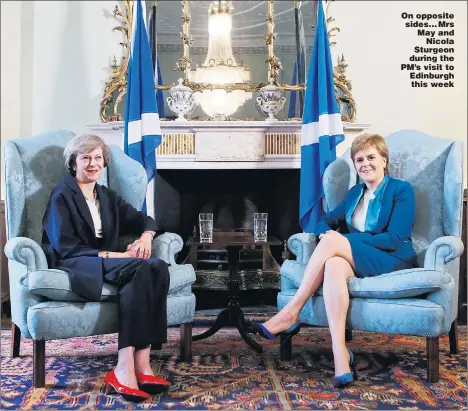  ??  ?? On opposite sides... Mrs May and Nicola Sturgeon during the PM’s visit to Edinburgh this week