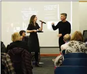  ?? PHOTO COURTESY OF TIM PARÉ ?? Liz Lombard and Tim Paré lead a Talkin’ Broadway discussion group at the West Bloomfield Township Public Library.