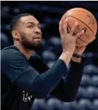  ?? RUSSELL ISABELLA / USA TODAY SPORTS ?? Forward Jabari Parker warms up recently prior to a Bucks-Jazz game in Salt Lake City.