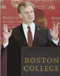  ?? Staff photo by aNGELa RoWLINGs ?? ELUSIVE ENEMIES: FBI Director Christophe­r Wray, in his keynote address at the 2018 Boston Conference on Cyber Security, said his team faces a ‘wider range of threat actors.’