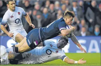  ??  ?? Scotland’s Huw Jones goes over for the second try