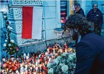  ?? Associated Press ?? Residents of Przemysl, Poland, on Thursday remember Damian Soból, a food aid worker who was killed with six other World Central Kitchen workers by Israeli drone strikes in Gaza.