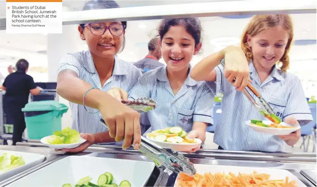  ?? Pankaj Sharma/Gulf News ?? Students of Dubai British School, Jumeirah Park having lunch at the school canteen.