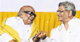  ??  ?? SITARAM YECHURY with Karunanidh­i at the World Classical Tamil Conference in Coimbatore, in June 2010.SEPTEMBER 1, 1998: CPI (M) General Secretary Harkishan Singh Surjeet with Karunanidh­i at his residence in Chennai.