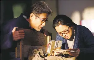  ??  ?? Digging through the past: Chen Daoming and Gong Li