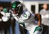  ?? Godofredo A. Vásquez / Associated Press ?? New York Jets wide receiver Garrett Wilson, the 10th overall pick last April, has set the team rookie marks with 74 receptions for 1,014 yards.