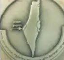  ?? (Facebook) ?? A PHOTO FROM the rapper Hatzel’s Facebook shows a medal picturing Israel without the Golan Heights, which was distribute­d to soldiers who fought in Operation Protective Edge.