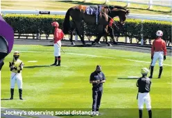  ?? ?? Jockey’s observing social distancing