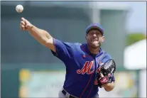  ?? SUE OGROCKI — THE ASSOCIATED PRESS ?? Mets’ pitcher Max Scherzer delivers during a spring training game against the Marlins Monday in Jupiter, Fl.