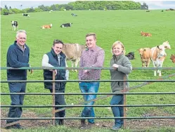  ??  ?? Rob, Tom, Rory and Alison Stodart farm land near Forfar.