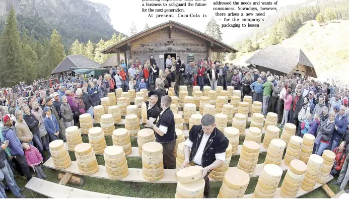  ??  ?? FARMERS pile up pieces of cheese during the traditiona­l “Chaesteile­t” (Cheese allocation) in Justistal, 40kms south of Bern, Switzerlan­d.