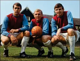  ??  ?? HAMMERS HEROES: World Cup winners (from left) Hurst, Bobby Moore and Peters were the pride of West Ham’s academy ever since 1966