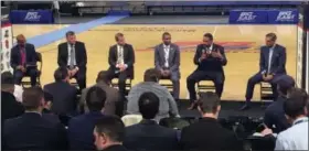  ?? PAUL MONTELLO — THE ASSOCIATED PRESS ?? From left to right, moderator Tarik Turner Moderator; Creighton coach Greg McDermott; Marquette coach Steve Wojciechow­ski; Butler coach LaVall Jordan; Providence coach Ed Cooley and Villanova coach Jay Wright chat during Big East media day in New York.