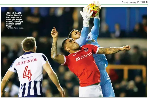  ?? PICTURES: Action Images ?? LOOK, NO HANDS: Charlton Athletic’s Josh Magennis, a former goalkeeper himself, challenges Millwall’s Jordan Archer