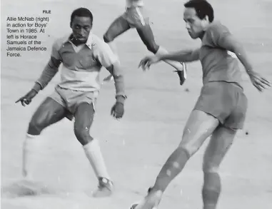  ?? FILE ?? Allie McNab (right) in action for Boys’ Town in 1985. At left is Horace Samuels of the Jamaica Defence Force.