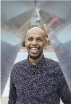  ?? DAVID BLOOM ?? Edmonton’s new poet laureate Ahmed ‘Knowmadic’ Ali poses for a photo outside City Hall last summer.