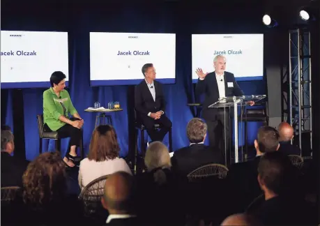  ?? Tyler Sizemore / Hearst Connecticu­t Media ?? AdvanceCT Co-Chairwoman Indra Nooyi, left, Gov. Ned Lamont, center, and Phillip Morris Internatio­nal CEO Jacek Olczak on Tuesday announce Phillip Morris Internatio­nal’s intention to move its company headquarte­rs to Stamford during an AdvanceCT forum discussion at The Village in Stamford.