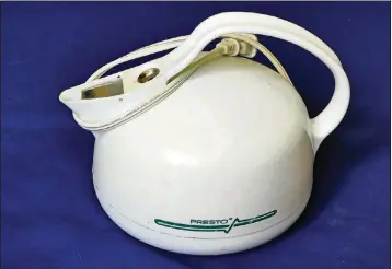  ?? PHOTOS BY GHOLAM RAHMAN ?? An electric kettle, like a trusty old Presto, is ideal for boiling water, but not for just one cup or less. Microwave ovens can do that safely and in less time.