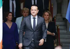  ?? ?? IRISH Prime Minister Leo Varadkar, front, arrives for a statement in Dublin, Ireland, Wednesday, March 20, 2024. Irish Prime Minister Leo Varadkar says he will step down as leader of the country as soon as a successor is chosen. / AP