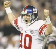  ?? Chris O'Meara / Associated Press ?? Giants quarterbac­k Eli Manning reacts after throwing the gamewinnin­g touchdown pass to Plaxico Burress during the fourth quarter of Super Bowl XLII against the New England Patriots.