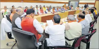  ??  ?? BJP chief Amit Shah holding a meeting with ministers of the Yogi Adityanath government at the party office in Lucknow on Saturday.