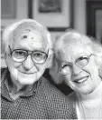  ?? Nick Krug/ The Lawrence Journal-World via AP ?? Walter “Hob” Crockett and his wife, Helen, pose for a photo Tuesday in their Lawrence, Kan., home. Hob, 96, and Helen, 93, recently celebrated their 74th wedding anniversar­y.