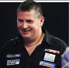  ??  ?? Easy does it: Anderson brushed aside the challenge of James Wade
