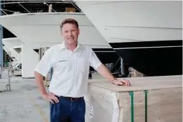  ??  ?? BELOW Greg Haines, Maritimo Yachts’ internatio­nal sales and marketing manager, is also a boat builder RIGHT The company describes the Maritimo 70 as a ‘go anywhere’ family yacht