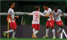  ?? Photograph: Lluís Gené/AFP/Getty Images ?? Tyler Adams (second right) celebrates with his RB Leipzig teammates after scoring the winner against Atlético Madrid in the Champions League quarter-final.