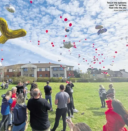 ?? Picture: Steve Salter ?? Two of the balloons spell ‘Ty’ as they float into the sky
