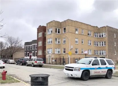  ?? SAM CHARLES/SUN-TIMES ?? A Chicago police SUV sits at the entrance of the 3900 block of West Van Buren Street on Tuesday afternoon.