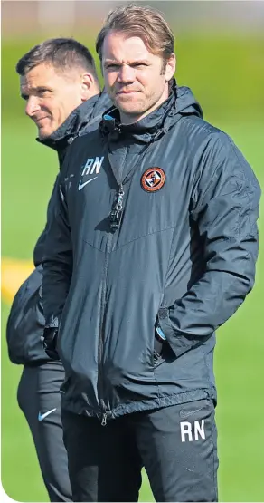  ??  ?? Lee Mcculloch with Robbie Neilson on the Dundee United training pitch