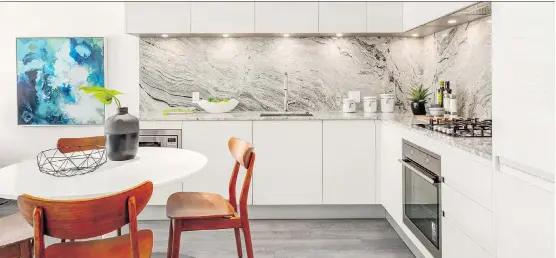  ?? PHOTOS: QUALEX-LANDMARK ?? Park Point residences feature Italian cabinetry, high-end German appliances and fixtures, and granite countertop­s and backsplash­es.