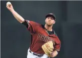  ??  ?? The Diamondbac­ks’ Sunday starting pitcher Merrill Kelly limited the Giants to a run over 5 2/3 innings to earn the victory at Chase Field in Phoenix.