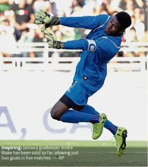  ??  ?? Jamaica goalkeeper Andre Blake has been solid so far, allowing just two goals in five matches. — AP