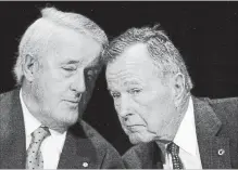  ?? J. SCOTT APPLEWHITE
THE ASSOCIATED PRESS ?? Former prime minister Brian Mulroney, left, talks with former U.S. president George H.W. Bush at a conference on NAFTA in Washington in December 2002. The two last visited in September.