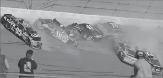  ?? ASSOCIATED PRESS FILE PHOTO ?? Only 14 cars finished Sunday’s race at Talladega that featured three red flags in the final 17 laps.