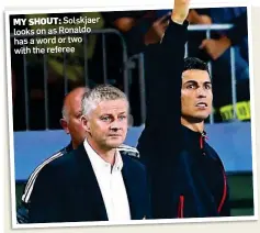  ?? ?? MY SHOUT: Solskjaer looks on as Ronaldo has a word or two with the referee