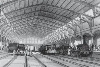  ??  ?? Brunel’s Bristol (Temple Meads) terminus of 1840 with its 72ft span timber roof and slender Gothic arches proved to be long lived, despite the rapid expansion of the GWR network seeing it become a London-facing terminus on a through route. This busy scene from circa 1846 records a ‘Firefly’ class 2-2-2 just before its departure for London. The engine shed is beyond the back of the train. This terminus would be extended in 1878 as part of the creation of a through station on the neighbouri­ng site, and in this form it continued to see trains as late as 1966, by which time the need for additional east-facing platforms was lessened by route closures.