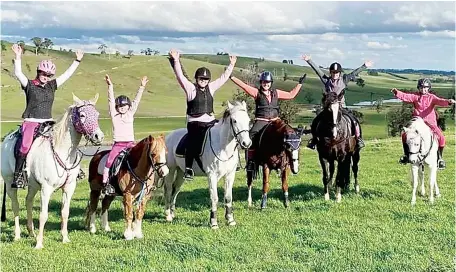  ??  ?? Neerim District Pony Club members raise their arms to the success of the club (from left) Caley Rees, Anna Rees, Alexandra Bailey, Georgia Custance, Makalah Crichton and Maddy Feil